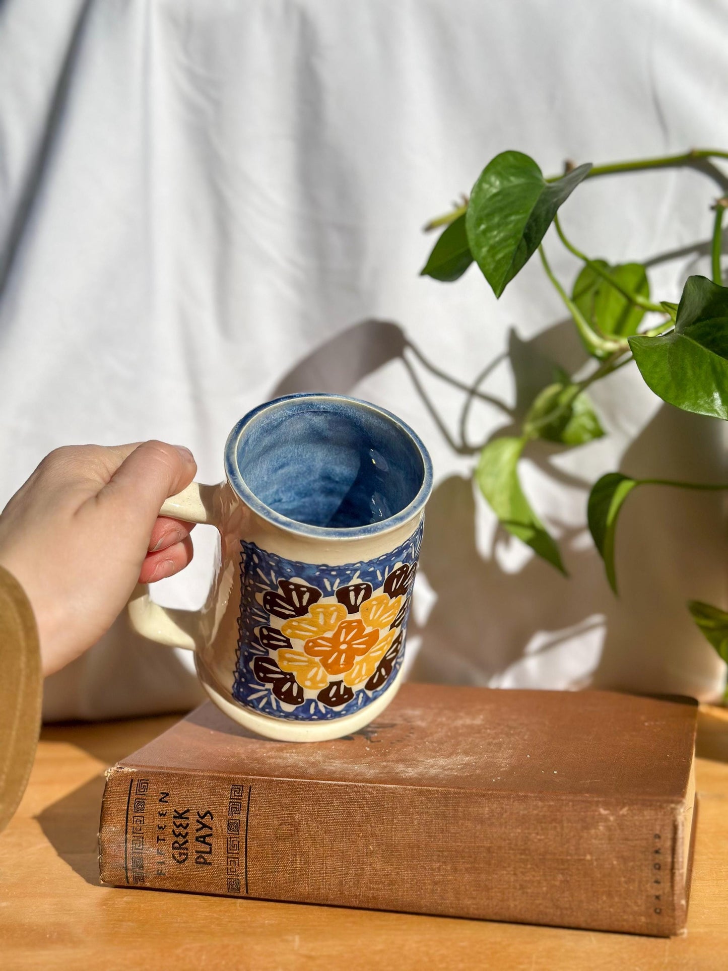 blue inside of tall tankard for hot beverages